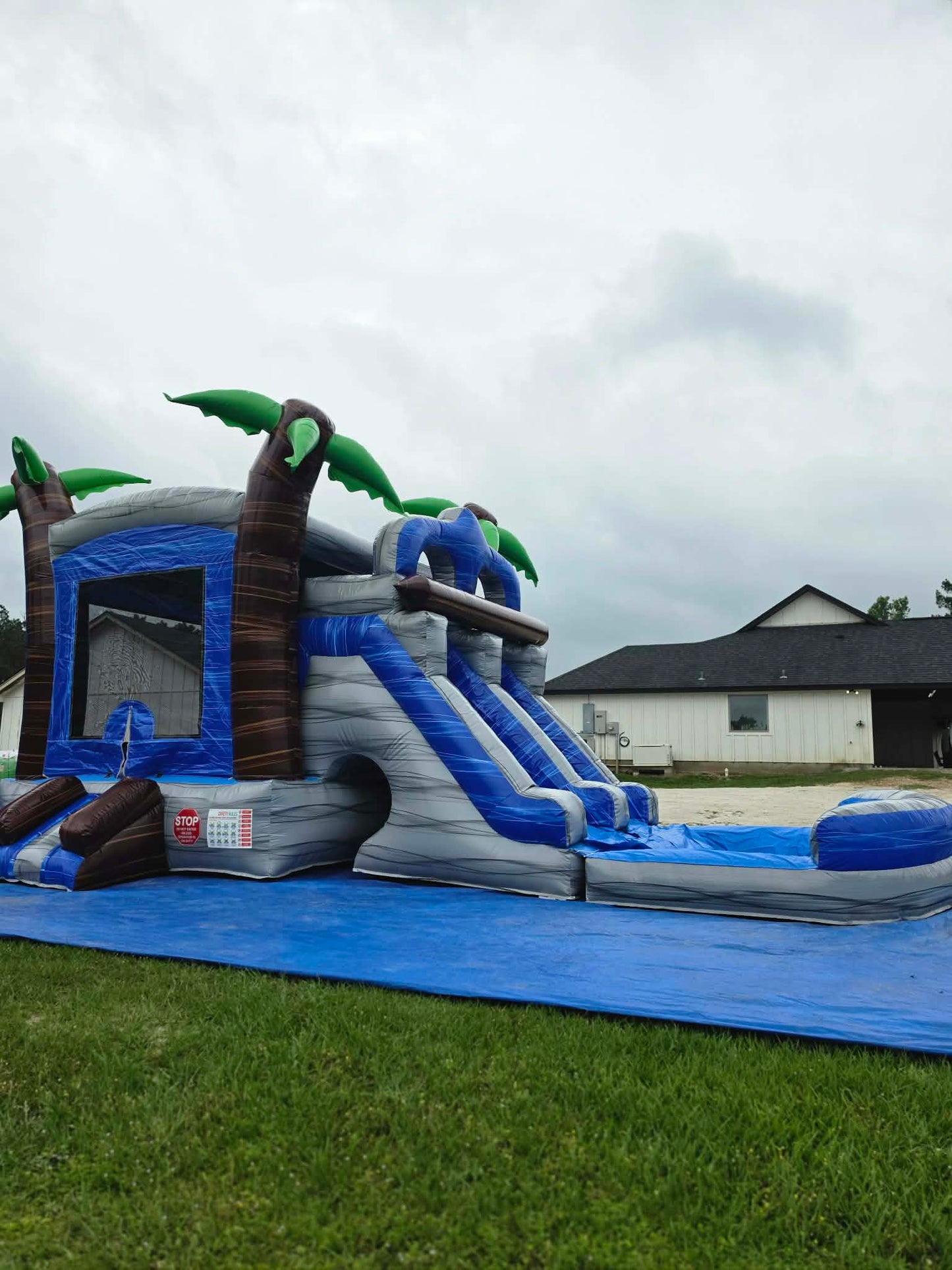 Blue Lagoon Bounce House with dual slides + pool