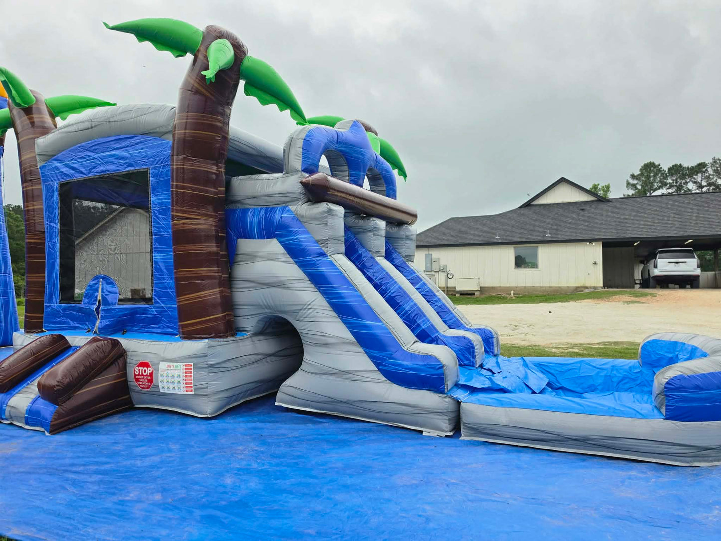 Blue Lagoon Bounce House with dual slides + pool